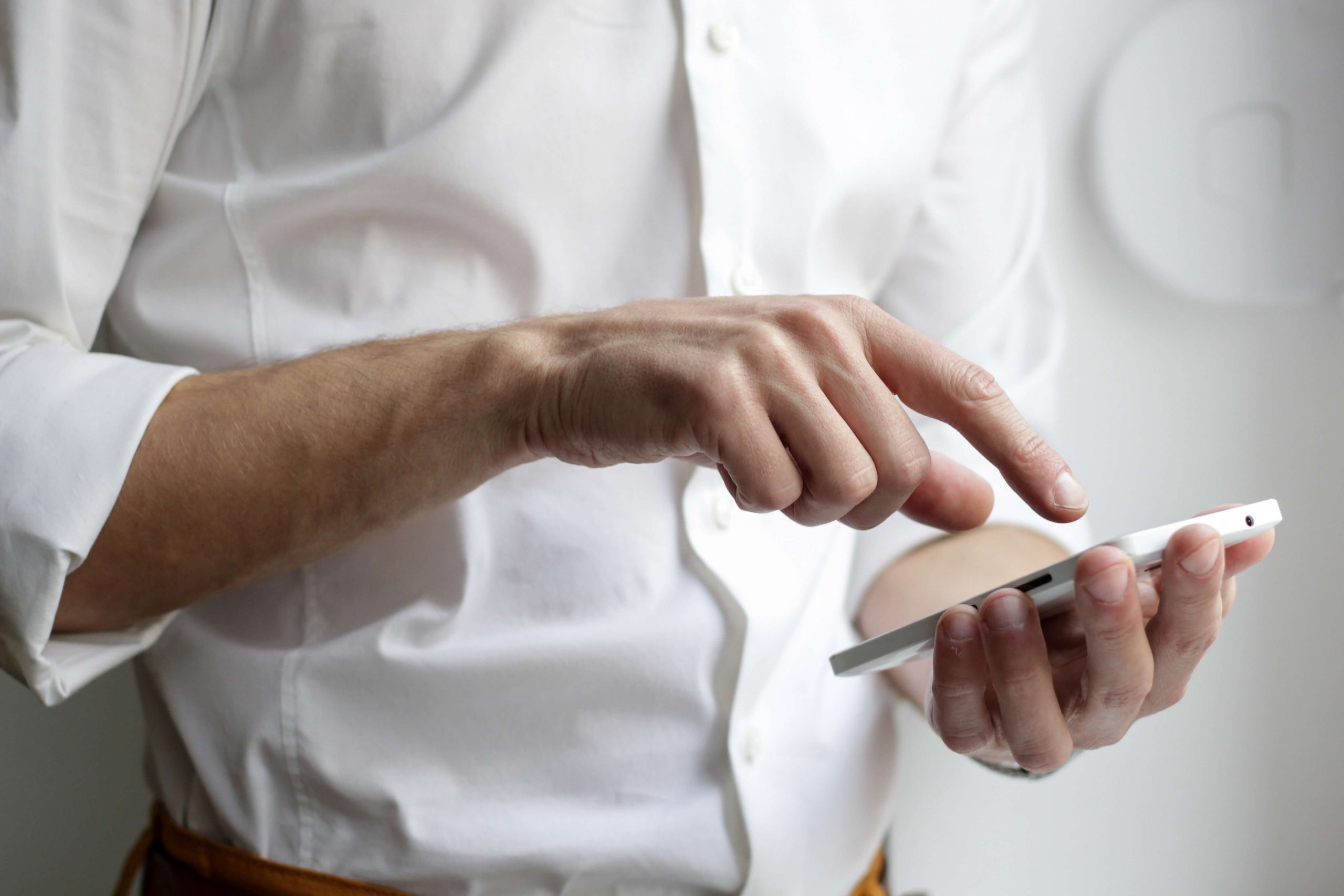customer holding smartphone